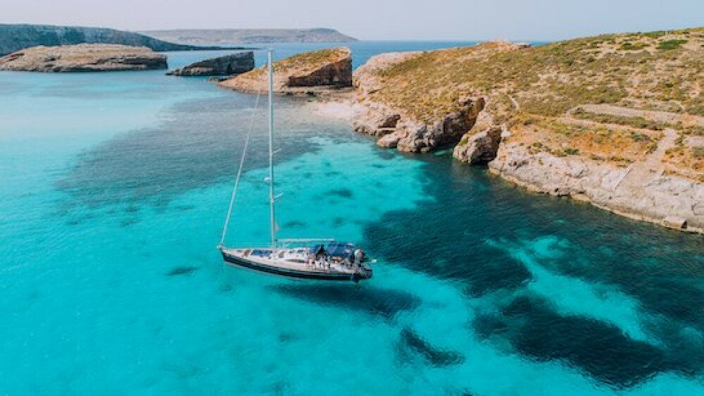 Aerial of Yacht in Blue Lagoon, off Comino copy