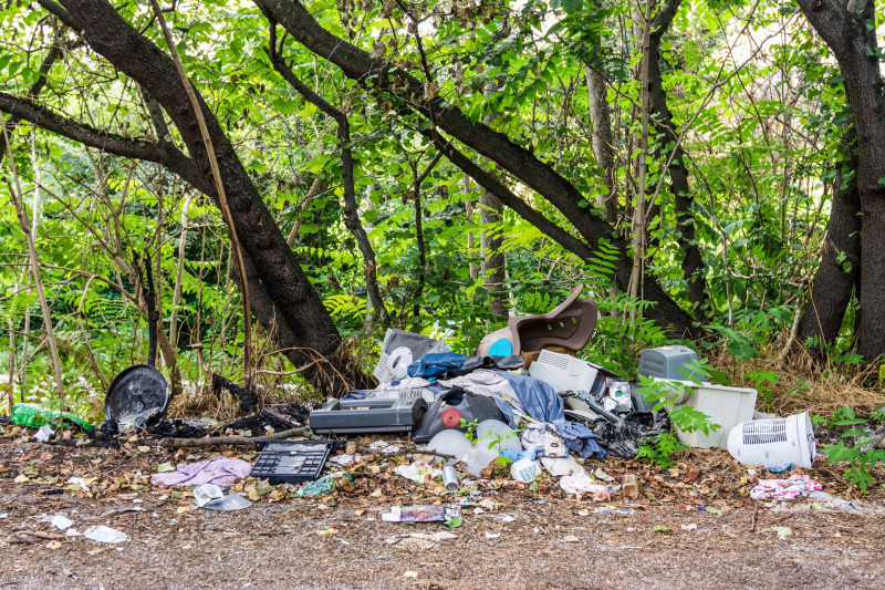 garbage abandoned in the countryside near the road