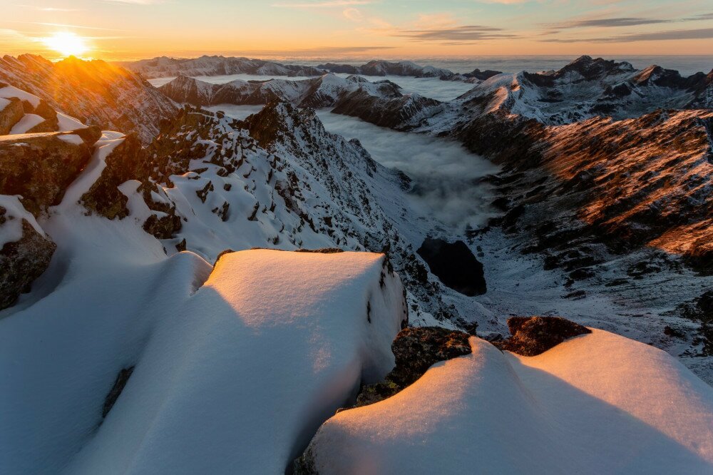 Shot of snowy mountains in winter morning sunlight